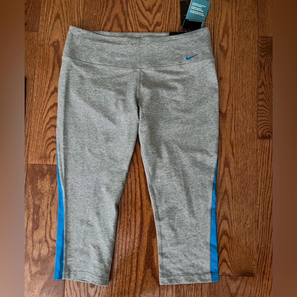 NWT Nike women’s grey and sky blue Dri Fit leggings size L